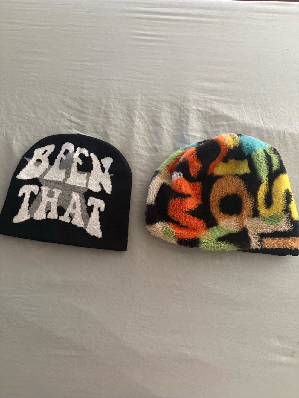 Black Beanie with “BEEN THAT” text and colorful beanie bundle